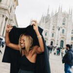Yvonne Orji Instagram - Just a girl in the city of Milan, or as Barbara would say, “A Town’s woman.” (IYKYK 😉) • 📸: @modehunter Hair: @mitchellcantrellbeauty Makeup: @dalila_mua Coat: @thefrankieshop Top: @simkhai Pants: @khaite_ny Frames, shoes, jewelry: @ysl #milanfashionweek #mfw