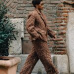 Yvonne Orji Instagram - I went Grace Jones for Tokyo James. • OF COURSE I attended the Nigerian designer showing at Milan Fashion Week! Duh! And Omo Naija DID. NOT. DISAPPOINT! @tokyojamess your designs were beyyonndd! Sooo many pieces I’m coming for! Thank you for having me and reppin 🇳🇬🇳🇬🇳🇬 so lovely!! • Hair: @mitchellcantrellbeauty Makeup: @madeleinefeeney Suit: @tokyojamess Styling: @georgmedley Shoes: @driesvannoten Frames: @ysl Earrings: @zara Swag: on a hundred thousand trillion. Knee game: skrroong (but that lean almost took me clean out 😂) 📸: @modehunter #milanfashionweek #mfw
