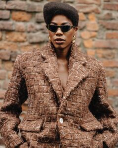 Yvonne Orji Instagram - I went Grace Jones for Tokyo James. • OF COURSE I attended the Nigerian designer showing at Milan Fashion Week! Duh! And Omo Naija DID. NOT. DISAPPOINT! @tokyojamess your designs were beyyonndd! Sooo many pieces I’m coming for! Thank you for having me and reppin 🇳🇬🇳🇬🇳🇬 so lovely!! • Hair: @mitchellcantrellbeauty Makeup: @madeleinefeeney Suit: @tokyojamess Styling: @georgmedley Shoes: @driesvannoten Frames: @ysl Earrings: @zara Swag: on a hundred thousand trillion. Knee game: skrroong (but that lean almost took me clean out 😂) 📸: @modehunter #milanfashionweek #mfw