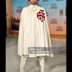 Yvonne Orji Instagram – Lord, have mercy. Father, help us all… 🙏🏾
•
Yall, The @bookofclarence is a MUST SEEE! The performances were brilliant. The direction is immaculate. @jeymes did what was SUPPOSED to be done! In theaters THIS Friday! Let’s break the box office 
•
Hair: @jacobaaronn 
Makeup: @kimoramulan 
Cape: Vintage boutique in Florence, Italy 
Shorts: @altuzarra 
Boots: @schutz 
Earrings: @earring_envy 
Glow: The Glory of God.