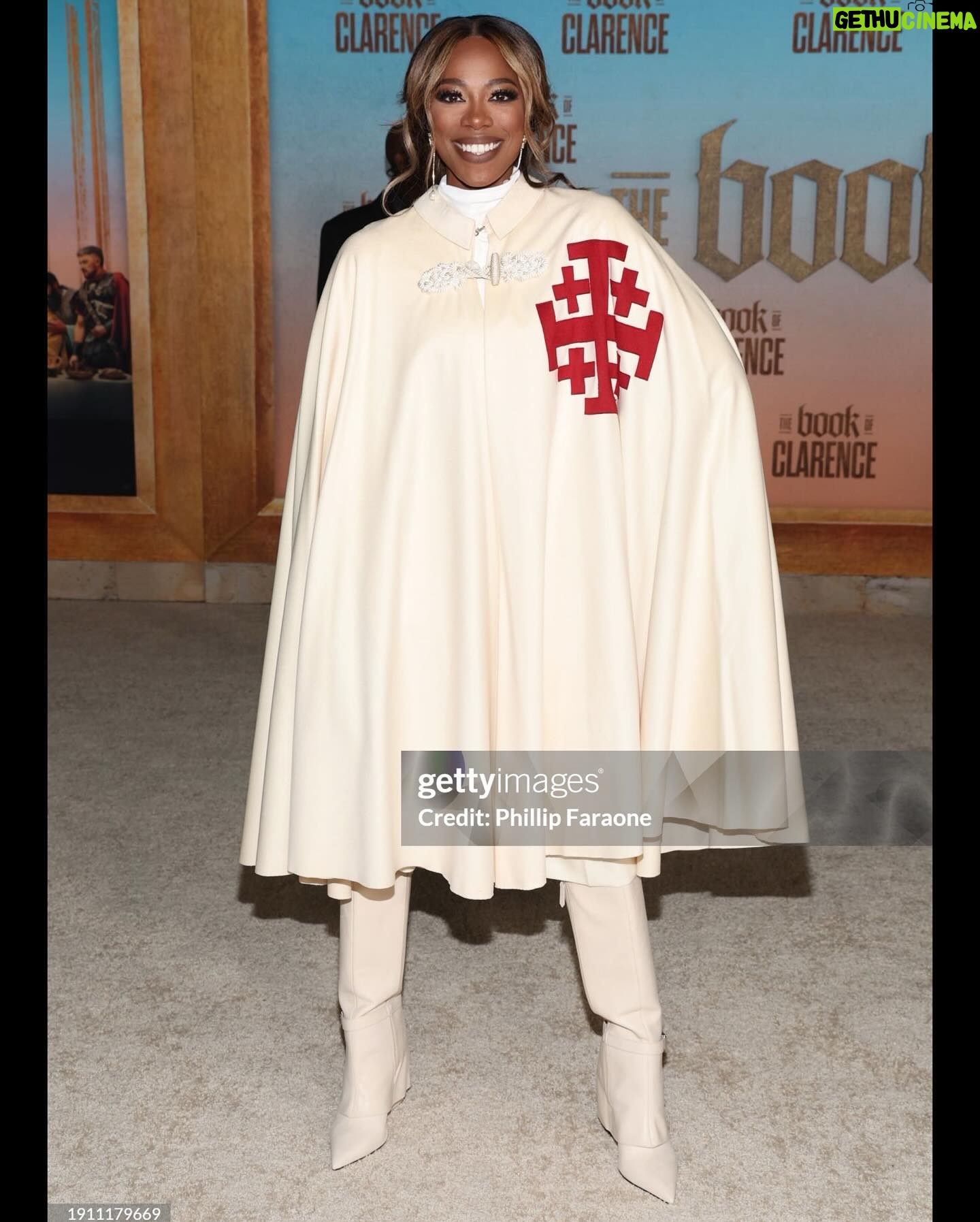 Yvonne Orji Instagram - Lord, have mercy. Father, help us all… 🙏🏾 • Yall, The @bookofclarence is a MUST SEEE! The performances were brilliant. The direction is immaculate. @jeymes did what was SUPPOSED to be done! In theaters THIS Friday! Let’s break the box office • Hair: @jacobaaronn Makeup: @kimoramulan Cape: Vintage boutique in Florence, Italy Shorts: @altuzarra Boots: @schutz Earrings: @earring_envy Glow: The Glory of God.