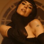 Zeina Makki Instagram - IT’S OUT NOW 🎙️🎶 My new song Abel ma trouh Is out now on ALL PLATFORMS Watch the music video on youtube LINK IN BIO ❤️‍🔥 Directed by: @sergemajdalany & @andykhaouli Composer: @danielgsaad Lyrics: @danielgsaad Arranged by @voxboxstudiosbeirut Mix & Mastering : @rogerabiakl Producer: @sandrasebaaly @rawproduction.hs Line Producer: @sergemajdalany Supervising Producer: @rogerzougheb DOP: @tonielkhazen_dp Art Director: @miaelhajal Stylist: @styledbyibra Zeina Dressed by: @krikorjabotian @amiralkasm @nourfathallah Assistant Stylist: @patiille Glam House @assaadhairdesign Makeup Artist: @nizar_mua Hair Stylist: @houssein_hairdresser Starring: @imadyoussef Main Role: @sylviosarkis Leading Actors: @ghiwanaddaffakhry @viv_bechara @youssefkhawly @iambahaeddine @marylouhamalian @rosey.n Casting Director: @sylviosarkis BTS: @celine.dagher_ Choreographer: @jeansakr00 Digital Artist: @anthonyakhalil Production Coordinator: @margueritta_maady @marilyy.__ Focus Puller: Salim Sadaka Steady Cam: @steadicharbel Equipment: @gammaengineeringmiddleeast Edited by: @andykhaouli & @sergemajdalany Color Grading: @pixelmob Colorist: @dimageagea Sponsors: @enabbeirut @wassim.shalabi Cake by: @robins.lb Catering: @theglowparadise @kebbetzamen Powered by Grand Cinemas Special Thanks: @ramzimoghabghab @hragjeghalian @evelyna.mouhawess Eva Saade @stephan.robin @sherine_aboul_ezz @isaacfahed @samlahoud @doris_saba @beirutfilmsociety @snunu.co @domaine_wardy @double.s.cake @prescillaelkhoury @paparazzibeirut