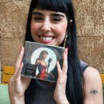 Zeina Makki Instagram - Here's Zeina Makki's heartfelt reaction to unwrapping her CD for the very first time. Witness the pure joy and emotion of this special moment. 💿 Her new song 'Abel Ma Trouh' is available on all streaming platforms.🎶🎙️✨ . . #ZeinaMakki #VideoReaction #Singer #Actress #زينه_مكّي #قبل_ما_تروح #زينة_مكي