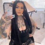 Zhavia Ward Instagram - @FashionNova 💰💰💰 wearing Roll With Me Belted Faux Leather Short - Black 🖤/ Show Me Around Halter Top - Black 🖤/ Anaya Mini Dress - Black🖤
