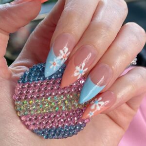 ALB in Wonderland Instagram - nail closeup! what’s better for summer than daisies right? #pride