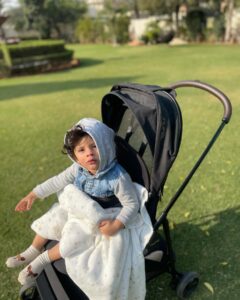 Aastha Sharma Instagram - First work trip with this little monkey who’s turning 1 and I can’t believe it’s almost a year with this cuteness ❤️🧿❤️ Thank you @nuna_india @dinky_nirh he’s clearly obsessed with his stroller ❤️ Also thank you @ashidua masi and Rahil for making me look like a stud in this jacket. We love you 🥰