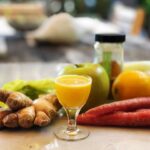 Abbie Cornish Instagram - If you have a juicer at home here is a quick and easy to make a vibrant immune booster shot that will help you stay healthy and strong, naturally. Full of vitamins and minerals (especially Vitamin C) and other goodies (for example the turmeric is anti-inflammatory), it will keep for about 3 days in the fridge if you’d like to make extra and bottle it. Much easier that way : ) In a juicer, juice (in this order from most to least amounts, depending on your taste preference): Lemon, ginger, orange, carrot, apple, celery, turmeric (I used turmeric powder which you can just add to the juice and stir). Pour into a small glass and enjoy for an instant uplifting boost. ✨