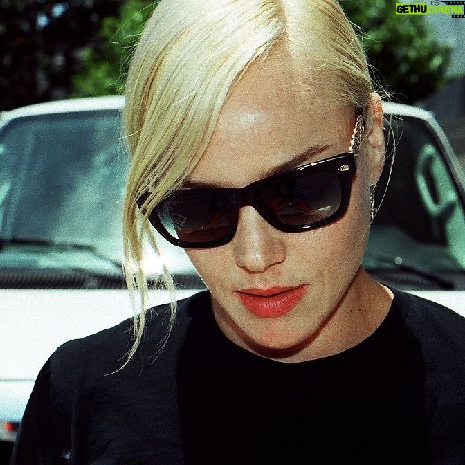 Abbie Cornish - 12.5K Likes - Circa blonde hair, red lips, and all black everything ~ Photo by Eric Johnson