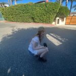 Abby Donnelly Instagram - my hobbies include: •dusting sand off sunscreen •pretend hitchhiking •standing in the road to take a picture