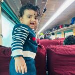 Abi Navya Instagram - Train travel for the first time with dhruv🥰🎉😘 laddu’s happy face 🤩 and he found one new girlfrnd in train 😆🫣😘he literally enjoyed the whole travel time ✨✨✨✨🫣 Wearing cotton kurta from @aaryes.collection