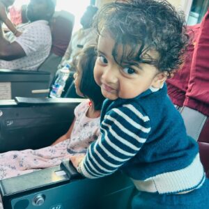 Abi Navya Instagram - Train travel for the first time with dhruv🥰🎉😘 laddu’s happy face 🤩 and he found one new girlfrnd in train 😆🫣😘he literally enjoyed the whole travel time ✨✨✨✨🫣

Wearing cotton kurta from @aaryes.collection