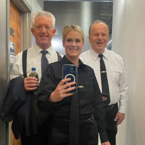 Abigail Hawk Instagram - Friends can arrive unexpectedly in our industry. Fast families get made. Set life is intense. These friendships can flourish and flounder quickly, flashes in the pan, serving their purpose in the moment. Or. Or… they can grow. They can become these gorgeous feral inexplicable funny deep-rooted things. 

I am already bereft at the thought of not seeing these two every week. I can’t define it, can’t explain it. I don’t need to. You have all witnessed the truth of our bond. We just…love each other. 

Yes, we have a Dream Team text thread. No, you will never be privy to how wildly irreverent it is. No, our fearless leader is not on it (we value our jobs!) But what I can tell you is that they are the third contacts that come up in my phone after my husband and my mom. I can also tell you our conversations are a constant source of joy. They are my protectors and the biggest pains in my ass. I would do absolutely anything for them. (And honestly, I have). We sing together. We dance together. We laugh and cry together. 

Thank you, boys. It has been the honor of my life being your den mother. (Bob will text me with a #winning meme about raccoons and Greg will correct his grammar in 3, 2, 1…)