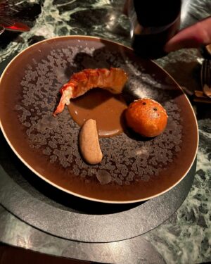 Adrienne Cheatham Instagram - Whoever said fine dining is dead hasn’t been out recently. At least they haven’t been to @saga_nyc 

Don’t get me wrong, I’m not always in the mood for a long dinner in a stuffy setting but Saga has upended that. My husband can wear his J’s and not get harassed or get dirty looks, and the music is what I would be listening to at home…hip hop, R&B, rock. It’s definitely fancy, but not stuffy and definitely fun. And more importantly THE FOOD is delicious and the execution is unbelievable! One of the best meals/dining experiences I’ve had in a minute. Thank you @chefjameskent and the amazing team for the warm hospitality and great night! 🤘🏽🔥🥂

#nyc #nycnights #datenight #finedining #fundining #theviewfromhere #thesagacontinues