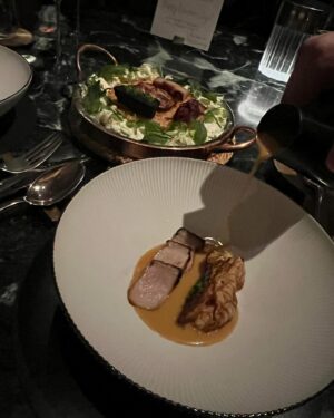 Adrienne Cheatham Instagram - Whoever said fine dining is dead hasn’t been out recently. At least they haven’t been to @saga_nyc 

Don’t get me wrong, I’m not always in the mood for a long dinner in a stuffy setting but Saga has upended that. My husband can wear his J’s and not get harassed or get dirty looks, and the music is what I would be listening to at home…hip hop, R&B, rock. It’s definitely fancy, but not stuffy and definitely fun. And more importantly THE FOOD is delicious and the execution is unbelievable! One of the best meals/dining experiences I’ve had in a minute. Thank you @chefjameskent and the amazing team for the warm hospitality and great night! 🤘🏽🔥🥂

#nyc #nycnights #datenight #finedining #fundining #theviewfromhere #thesagacontinues