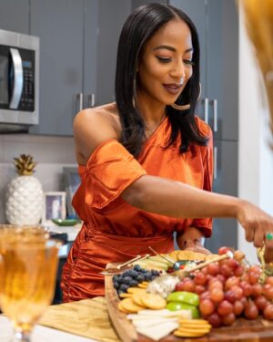 Africa Miranda Instagram - Back in my domestic goddess bag ✨
 
Holiday entertaining is officially in full swing. For my latest #GoFinding mission I transformed my kitchen island into an early Thanksgiving “Harvest Moon” tablescape with amazing finds from @homegoods!
 
Here are 3 tips for creating a great holiday tablescape – especially when you’re working with a small space or don’t have a traditional dining table:
 
1. Set a Color Scheme
A color scheme is vital for creating a cohesive and eye-catching moment. It also helps you not become overwhelmed when shopping and trying to make magic out of a hodgepodge of pieces. I wanted my design to have a warm, elegant and intimate setting, so I chose copper, pewter, and green with wood and gold accents.
 
2. Warm It Up
A kitchen island is fantastic – a fantastic slab lol! Create texture and warmth by using fabric and natural elements. I used a tablecloth across the center as my base and instead of hanging a wreath, I used it as a centerpiece with a pillar candle in the center to bring it all together. Wood candle holders and a tower of pampas grass added levels. Colored goblets provide a fun pop of color instead of traditional glasses.
 
3. Repurpose Your Past Favorite HomeGoods Finds
Shop the store and shop your house! Sometimes the perfect finishing touch you’re missing is sitting on your shelf. I used a decorative glass bowl, a sparkly Halloween pumpkin, and a wooden cutting board from previous shopping trips to complement and complete the setting perfectly.
 
For a closer look, check out my IG stories and make sure to visit your local HomeGoods for all your holiday entertaining needs! Share your Thanksgiving finds using #HomeGoodsFinds! #ad

📷: @d_whyte