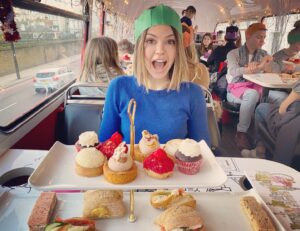 Aimee Teegarden Instagram - Enjoying afternoon tea time atop a double decker bus🧁🇬🇧☕️🚏🍬 👸🏼 #teatime #london