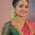 Akshaya Kandamuthan Instagram - Teamwork makes the dream work! Model: The radiant @akshaya_kandamuthanoffi your grace and beauty lit up every frame. Jewellery: @new_ideas_fashions added the perfect sparkle to enhance the elegance. Photographer: Capturing enchanting moments, kudos to @ganesh_toasty Blouse: Exquisite designs by @kalpana_bridal__studio complemented the overall look. Costume: A special thanks to @rmkv_silks for the stunning attire. Together, we've crafted magic! 💄📸👗 #PriyadharshiniMakeupArtist #Teamwork #CreativeCollaboration #GratefulHeart #DreamTeam #akshayakandamuthan #newideasfashions #kalpanabridalstudio #mua #bestbridalpackage