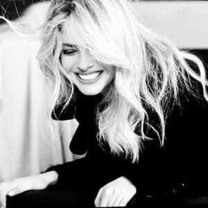 Alexandra Dinu Instagram - The highest state is laughter . 

.
.
#alexandradinu #blackandwhite #smile #blondehair #simplyme