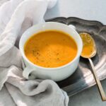 Ali Larter Instagram – I hope everyone is having a beautiful Sunday! I got a lot of requests for this carrot ginger soup so I’m sharing the recipe. It is so bright, tangy, creamy, healthy and delicious. My kids love it too. Enjoy! 🥕🥕🥕Sauté 1/2 cup onion in 2 TBLS coconut oil, add 4 cups carrots, 4 cups veg broth, 1 cup orange juice, 1 TBLS grated ginger, and a squeeze of lemon. Simmer for 20 minutes, purée and then return to pot and stir in 1 can of coconut milk. Salt and pepper to taste. 😘