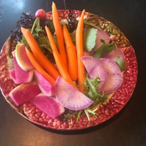 Alice Waters Instagram - Last night the restaurant made a little plate of beautiful radishes and carrot crudités for me to share with Tom Luddy and his sister who is visiting from back East. Thank goodness we have  all been vaccinated! It has been so long since I have been sipping a glass of rosé with dear friends.