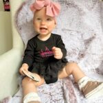 Alicia Banit Instagram – Cheeky munchkin is 11 months!

(And a day 😬)Oh my! As if she’s a month away from being ONE?! Every day keeps getting more and more fun, she brings so much joy to every single day! Especially when she’s having a laughing fit and snorts like a piggy! Girlfriend is on the move and crawling/trying to walk, she’s got her first molar with the other nearly through the gum and do I even need to say it? Has handled it like the champ she is! Her new favourite game is pretending to hand something to us to then steal it back, she thinks she’s hilarious! But also, she is. She’s poking her tongue out knowing she’s being cheeky, she loves talking and miss independent is so happy to play alone with her toys. Oh and can stand up in her cot! On the other hand she’s very clingy to mummy right now and loves cuddles. I think she’s actually a crocodile, she has that death roll at nappy change time down pat! She loooves dancing, she could hear music in the other room and will start to jig along to everyone’s delight and she definitely has the Wog gene, she uses her hands very expressively to emphasise the importance of what she’s saying 🤌🏼👈🏼. I can’t believe she’s one next month! The love I have for this little munchkin is indescribable, we are so lucky she’s ours 🤍
