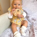 Alicia Banit Instagram - Happy half birthday Isla Joy! 6 MONTHS! I am actually mind blown that our baby girl is half a year old! Where has the time gone?! This has been a big month for Isla! Our lil pumpkin is eating pumpkin like it’s going out of fashion, she laughs so hard at the most random things (like Detho eating soup) and loves going for walks in her pram. So much so that she squeals with excitement and kicks her legs as if to say LETS GOOO! She babbles to herself a lot and then yells very loudly! Her favourite song is ‘You Make My Dreams (Come True) and she’s obsessed with Mud, morning chats with daddy and her grandparents. She has the sweetest little personality and is so social, she loves everyone! We can’t wait to see who she becomes over the next 6 months and beyond. We are so incredibly lucky to be her parents, our smiley girl is our whole world 🤍🖤
