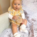 Alicia Banit Instagram - Happy half birthday Isla Joy! 6 MONTHS! I am actually mind blown that our baby girl is half a year old! Where has the time gone?! This has been a big month for Isla! Our lil pumpkin is eating pumpkin like it’s going out of fashion, she laughs so hard at the most random things (like Detho eating soup) and loves going for walks in her pram. So much so that she squeals with excitement and kicks her legs as if to say LETS GOOO! She babbles to herself a lot and then yells very loudly! Her favourite song is ‘You Make My Dreams (Come True) and she’s obsessed with Mud, morning chats with daddy and her grandparents. She has the sweetest little personality and is so social, she loves everyone! We can’t wait to see who she becomes over the next 6 months and beyond. We are so incredibly lucky to be her parents, our smiley girl is our whole world 🤍🖤