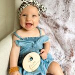Alicia Banit Instagram - 5 months with our baby 🥹💜 She is an angel! TWO big toothy pegs with more coming through which she’s handling like an absolute champ. She loves squealing and squeaking like a dolphin, she’s started to twist and roll everywhere (that’s so much fun while changing her nappy 🙄) and pretty sure we’ll be starting on solids soon because the girl is reaching for EVERYTHING we eat. She also sigh’s which is hilarious because honestly DO WE BORE YOU?! I can’t believe we’re another month down, time is moving so fast and even though this month has been rough with her teething and I’m more tired than I’ve ever been I am so beyond grateful for her beautiful soul in our lives. Watching her personality come to life is my favourite part of ever day 🤍