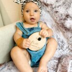 Alicia Banit Instagram - 5 months with our baby 🥹💜 She is an angel! TWO big toothy pegs with more coming through which she’s handling like an absolute champ. She loves squealing and squeaking like a dolphin, she’s started to twist and roll everywhere (that’s so much fun while changing her nappy 🙄) and pretty sure we’ll be starting on solids soon because the girl is reaching for EVERYTHING we eat. She also sigh’s which is hilarious because honestly DO WE BORE YOU?! I can’t believe we’re another month down, time is moving so fast and even though this month has been rough with her teething and I’m more tired than I’ve ever been I am so beyond grateful for her beautiful soul in our lives. Watching her personality come to life is my favourite part of ever day 🤍