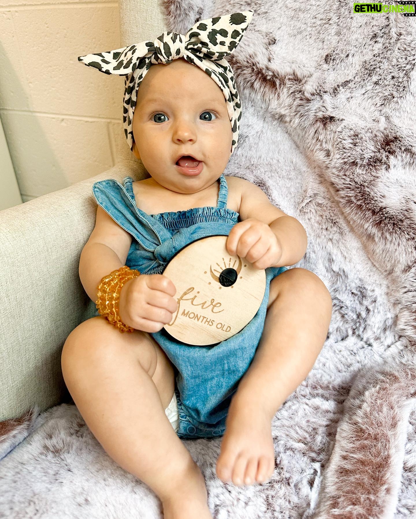 Alicia Banit Instagram - 5 months with our baby 🥹💜 She is an angel! TWO big toothy pegs with more coming through which she’s handling like an absolute champ. She loves squealing and squeaking like a dolphin, she’s started to twist and roll everywhere (that’s so much fun while changing her nappy 🙄) and pretty sure we’ll be starting on solids soon because the girl is reaching for EVERYTHING we eat. She also sigh’s which is hilarious because honestly DO WE BORE YOU?! I can’t believe we’re another month down, time is moving so fast and even though this month has been rough with her teething and I’m more tired than I’ve ever been I am so beyond grateful for her beautiful soul in our lives. Watching her personality come to life is my favourite part of ever day 🤍