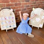 Alicia Banit Instagram - Just found these first birthday pics in my phone and STOP IT SHES SO CUTE! Also, quick shoutout to two incredible companies. Firstly @pocketprintsapp the awesome decal prints attached to this board can be stuck and unstuck multiple times and are perfect! My house is filled with photos printed out (like my childhood) and photo albums so that all of my memories of little miss are right in front of my face and not on my phone. Their app is sooo easy to use and order from too and the quality is perfection. So grateful I found them 🙌🏼 And @kellycreativeco for the unreal custom made milestone boards. Still blown away that I could barely describe what I pictured in my mind and she created these stunning pieces! Communication was FAB and the whole process was so easy. Both of these companies made my life so much easier when it came to organising Isla’s birthday and I just wanted to give these small businesses some lovin!