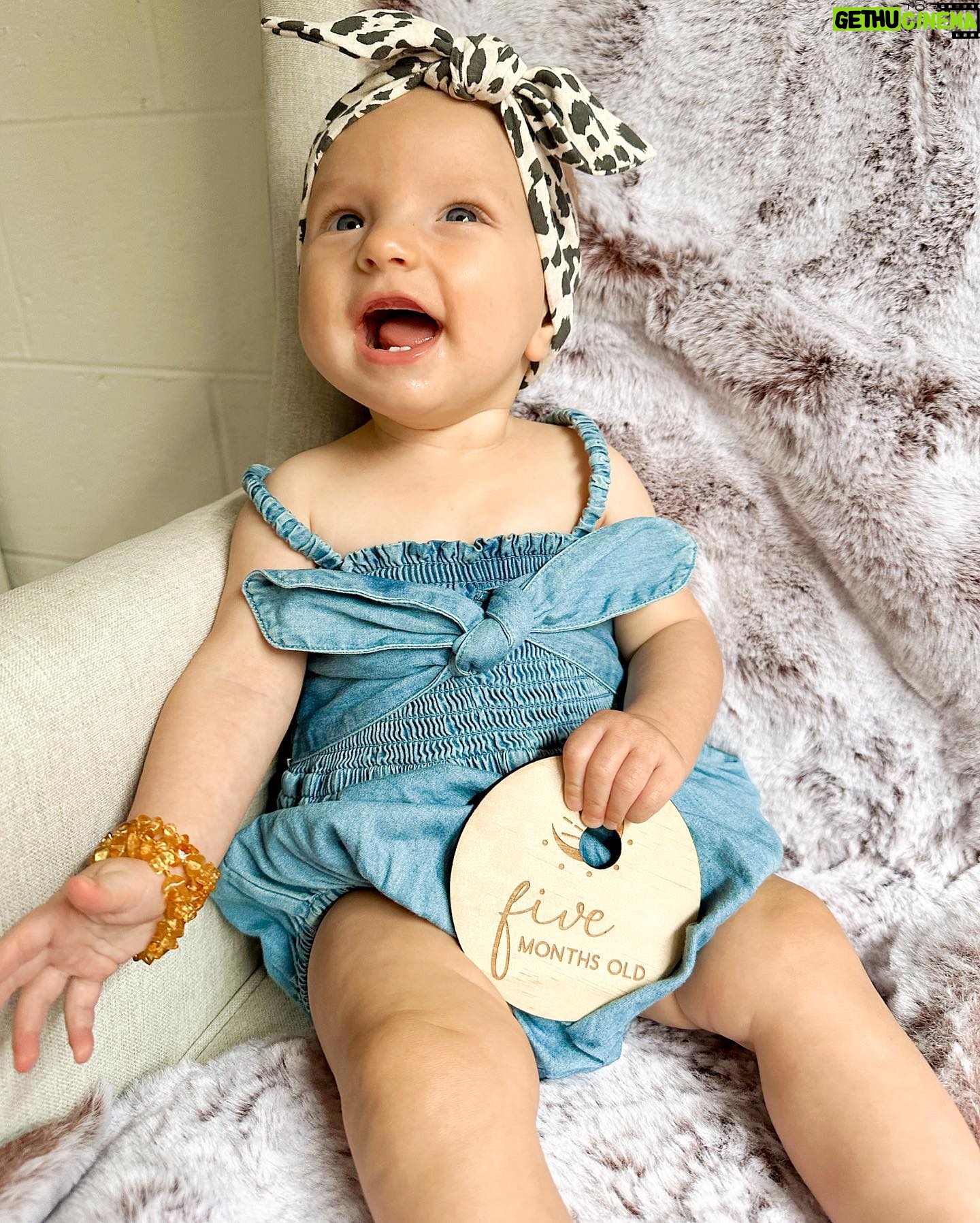Alicia Banit Instagram - 5 months with our baby 🥹💜 She is an angel! TWO big toothy pegs with more coming through which she’s handling like an absolute champ. She loves squealing and squeaking like a dolphin, she’s started to twist and roll everywhere (that’s so much fun while changing her nappy 🙄) and pretty sure we’ll be starting on solids soon because the girl is reaching for EVERYTHING we eat. She also sigh’s which is hilarious because honestly DO WE BORE YOU?! I can’t believe we’re another month down, time is moving so fast and even though this month has been rough with her teething and I’m more tired than I’ve ever been I am so beyond grateful for her beautiful soul in our lives. Watching her personality come to life is my favourite part of ever day 🤍