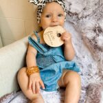 Alicia Banit Instagram - 5 months with our baby 🥹💜 She is an angel! TWO big toothy pegs with more coming through which she’s handling like an absolute champ. She loves squealing and squeaking like a dolphin, she’s started to twist and roll everywhere (that’s so much fun while changing her nappy 🙄) and pretty sure we’ll be starting on solids soon because the girl is reaching for EVERYTHING we eat. She also sigh’s which is hilarious because honestly DO WE BORE YOU?! I can’t believe we’re another month down, time is moving so fast and even though this month has been rough with her teething and I’m more tired than I’ve ever been I am so beyond grateful for her beautiful soul in our lives. Watching her personality come to life is my favourite part of ever day 🤍