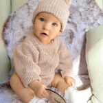 Alicia Banit Instagram - 9 months of our little miss 😍 Girlfriend is a professional clapper and loves to put on a show of waving and clapping most minutes in the day. She’s mastered Dadadada to the delight of Zac and the squeals that come out of her mouth make me think she was a dolphin in a past life. She will blow bubbles with her saliva which is hilarious, I remember sitting there for ages as a kid doing that and whenever she eats, miss independent must feed herself with her spoon. She loves sharing, a game of share the dummy before falling asleep is inevitable and the big sloppy kisses I’ve been getting melt my heart. Which is good cause she has also started scratching and slapping my face when she’s having a cry so honestly, lucky she’s cute. She’s sitting up like a pro Oh and she just casually can point out (specifically with her pointer finger) her favourite family members when you ask her where they are in her pictures on the fridge. Sorry, is my kid a genius or?! This past month her personality has grown so much and I’ve never cried more tears of joy than I do when watching her sleep. She is perfection 🤍