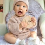 Alicia Banit Instagram - 9 months of our little miss 😍 Girlfriend is a professional clapper and loves to put on a show of waving and clapping most minutes in the day. She’s mastered Dadadada to the delight of Zac and the squeals that come out of her mouth make me think she was a dolphin in a past life. She will blow bubbles with her saliva which is hilarious, I remember sitting there for ages as a kid doing that and whenever she eats, miss independent must feed herself with her spoon. She loves sharing, a game of share the dummy before falling asleep is inevitable and the big sloppy kisses I’ve been getting melt my heart. Which is good cause she has also started scratching and slapping my face when she’s having a cry so honestly, lucky she’s cute. She’s sitting up like a pro Oh and she just casually can point out (specifically with her pointer finger) her favourite family members when you ask her where they are in her pictures on the fridge. Sorry, is my kid a genius or?! This past month her personality has grown so much and I’ve never cried more tears of joy than I do when watching her sleep. She is perfection 🤍