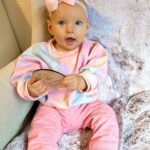 Alicia Banit Instagram – 7 months of our Isla Joy!

This little possum has a top tooth, has tried more foods than I can count and babbles MAMA among other words! I’m not sure she knows what she’s saying but I’m claiming it, her first word is definitely mama! She watches our mouths so intently when we try to teach her new words and she’s back in her dinosaur era roaring at everything. She whispers to herself and breathes like darth Vader when she’s bored and I honestly have never met a more smiley, laughable bub. Even through her first cold, our girl didn’t have a single day where she didn’t laugh and smile her way through it. We couldn’t be more in love with her, she is pure perfection 🥹