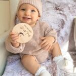 Alicia Banit Instagram - 9 months of our little miss 😍 Girlfriend is a professional clapper and loves to put on a show of waving and clapping most minutes in the day. She’s mastered Dadadada to the delight of Zac and the squeals that come out of her mouth make me think she was a dolphin in a past life. She will blow bubbles with her saliva which is hilarious, I remember sitting there for ages as a kid doing that and whenever she eats, miss independent must feed herself with her spoon. She loves sharing, a game of share the dummy before falling asleep is inevitable and the big sloppy kisses I’ve been getting melt my heart. Which is good cause she has also started scratching and slapping my face when she’s having a cry so honestly, lucky she’s cute. She’s sitting up like a pro Oh and she just casually can point out (specifically with her pointer finger) her favourite family members when you ask her where they are in her pictures on the fridge. Sorry, is my kid a genius or?! This past month her personality has grown so much and I’ve never cried more tears of joy than I do when watching her sleep. She is perfection 🤍