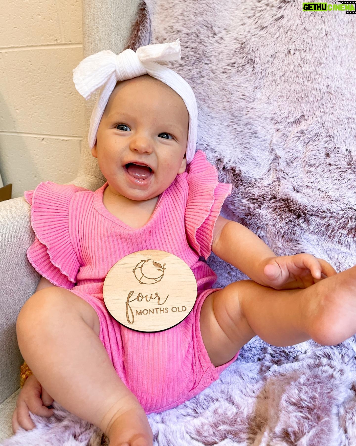 Alicia Banit Instagram - Okay little miss 4 month old 🤯 Our girl is growing up so fast! Literally everybody she meets says she’s so chill and happy, she’s rolling around like a champion and she has a TOOTH! SO MUCH DROOL! She loves people and her laughs are what dreams are made of. This was the fastest month by far and the biggest growth spurt! Those blue eyes are always watching and she’s so curious about everything around her. Watching her personality come to life is our favourite thing in the world and I didn’t think it was possible but our love for her grows every single day!