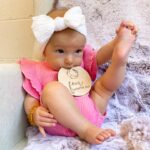 Alicia Banit Instagram - Okay little miss 4 month old 🤯 Our girl is growing up so fast! Literally everybody she meets says she’s so chill and happy, she’s rolling around like a champion and she has a TOOTH! SO MUCH DROOL! She loves people and her laughs are what dreams are made of. This was the fastest month by far and the biggest growth spurt! Those blue eyes are always watching and she’s so curious about everything around her. Watching her personality come to life is our favourite thing in the world and I didn’t think it was possible but our love for her grows every single day!