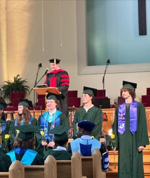 Alicia Witt Instagram - my honorary godson is a graduate 🧑‍🎓

so beyond words proud of the young man i’ve had the honor of watching @ben.larson09 become. his next chapter is @usnavy boot camp in july, following his amazing brother (and also my honorary godson 😭) @samlarsxn, home on leave to attend ben’s baccalaureate. 

i remain forever in awe at @elizaann360 for making it all look so easy. superwoman ❤️

grateful for this chosen family.