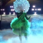 Alicia Witt Instagram - a lifetime high to get to sing this song from behind the #dandelionmask. #overtherainbow has forever been one of my favorite songs - it has more meaning to me than most know. filming last week’s episode of #themaskedsinger while going back and forth between vancouver - it felt and still feels like a dream. thank you to the incredible *everyone* there at @maskedsingerfox for this gift. this is one grateful dandelion. much more to say but now i have to go to sleep for early morning press all about this tomorrow! 💚💛