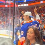 Alicia Witt Instagram - SOMUCHFUN was had this weekend!! what a blast to take a quick jaunt to nyc to watch the @ny_islanders WIN their playoff game against the @canes. now for tomorrow to stay in it! i’ve got my very own team jersey and so does @theimportanceofbeingernesth for good luck ☺️ congratulations to my friend, islanders and @ubsarena owner #jonledecky, and thank you for the most special weekend. also pictured: a whole bunch of @nyjets who were there to cheer us on, especially awesome sauce @malikktaylor who i sat next to for first period - and fellow christmas movie alumnus, @wesbrown225, who was attending as a longtime #islanders fan too!! 🧡💙 #goislanders #hockeyplayoffs