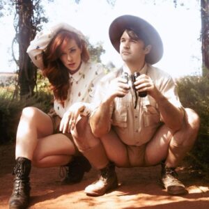 Alie Ward Instagram - True story: for our engagement photos 2 years ago, @jarrett_sleeper was like, what if we do some of them in tiny shorts or giant ballgowns? Absolutely solid strategy. But while @vonswank was taking them, a big green & gold fig eater beetle buzzed by in the @nhmla garden and landed on my finger. This first shot is maybe my favorite because it’s goofy and campy, but so earnest with honesty, wonder & curiosity — things I adore about @jarrett_sleeper. He has the fastest brain and the most generous heart. Today is our anniversary, but every day is learning something new & being rascals. Cut bangs, text your crush, enjoy who you have while you have them. 💖