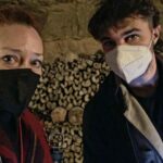 Alie Ward Instagram - Hi. Paris has hundreds of miles of secret abandoned tunnels under the streets and that they are filled with MILLIONS OF PEOPLES BONES. How about that? I interviewed a world expert on the Catacombs: French history professor and author Dr. Erin-Marie Legacey who gave me all the trivia and context. This week’s @ologies episode is up (link in bio) and it explains WHY ARE THE BONES THERE WHAT DO THEY SMELL LIKE WHO ARE THESE PEOPLE, and other questions that my brain was screaming. Enjoy, and Happy Spooktober. Has anyone else been to the Catacombs? How did you feel about them? 💀
