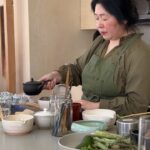 Ally Maki Instagram – Cherry blossom tea ceremony by Tomoko Imade Dyen @turningoffjapanese x @owiugoods. This was hands down one of the most special experiences I’ve had lately. Tomoko, who is an experienced Culinary Curator from Japan, just got back from Kagoshima (which is where my family is from) to curate and bring back some of the most special teas of the many seasons of Japan.
Tea ceremonies are more than just the act of drinking tea, but an invitation to commune and appreciate ritual and stillness. We learned so much about different teas and their origins, discovered my new favorite tea Chirancha, tried fermented Awabancha with sweet natto and Genmaicha from the shop in Kyoto where it was originally created. Each tea is paired with a handmade wagashi by @adzuki_life all served on @amandagnwn OWIU pottery. The whole ceremony was exceptional and brought us right back to Japan. Sign up for one of her future events (she has a waiting list!) We are bringing this experience to @asianamericangirlclub very soon so stay tuned. Trust me you will not want to miss this when it happens.
Our menu:
Sparkling Fukamushi-cha (Shizuoka)
Spring Crudités
Chirancha (Kagoshima)
Asparagus spring roll
Fermented tea tasting (Awabancha-Tokushima, Oolong-Kagoshima; Kohcha- Kyoto)
Savory and sweet Natto
Genmaicha (Kyoto)
Seasonal oshokuji
Matcha (Kyoto)
Sakuramochi and Sakura Mochi and Sakura Kiribashi by KASHI AMAIRO