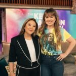 Ally Maki Instagram – Movie games and pregnant life on @kellyclarksonshow TODAY! The best combo. A forever memory that our little baby girl and I got to do the show together in NY! We love you @kellyclarkson 🫶 Tune in!