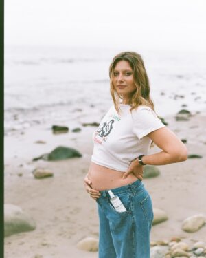 Aly Michalka Instagram - We found out the morning of our sold-out show at The Greek Theatre back in September. Our little one has been on stage with me across three states already and has even done some international traveling! Thankfully with some help from @natalistco, I’ve been able to have a smooth journey. I picked up their product last summer at a pharmacy because I loved that they were plastic neutral and the packaging set itself apart. Their ovulation test kit and pregnancy tests were super easy to use and affordable 😌 Now I’m applying their belly oil daily to keep my tummy nice and hydrated ‘til baby arrives!

We’re waiting to find out the gender cuz I’ve always loved a good surprise, but in the meantime we’ve been busy getting the nursery ready, meeting with my birth team, eating more protein than usual, going to Pilates, getting good sleep, and drinking lots of water. Somehow we’ve been able to still spend days in the studio writing music which hopefully finds its way into baby’s soul. I’m so grateful for all the amazing women I’ve leaned on these past 6 months (you know who you are) it makes me hopeful about the goodness in the world 💜 #natalistpartner