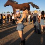 Alyvia Alyn Lind Instagram – saw willie nelson and the beach boys live, and ate way too much popcorn. successful first @stagecoach !!! 
@cookiepop_candypop