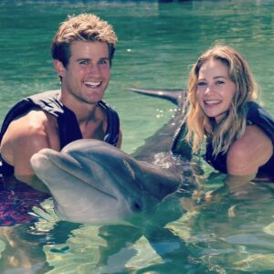 Amanda Leighton Instagram - Hawaiiiii trip with my love! 💙 Believe it or not dolphins are pretty heavy 🐬
