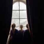 Amanda Owen Instagram - Through the arched window 🪟 we have….the possibility of no school bus ( they hope.) 🚌 ❄️ ❄️ ❄️ #yorkshire #snowing #wintery